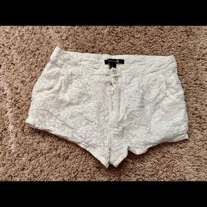 White lace shorts